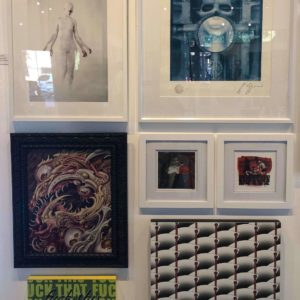 [THE CROSS] next to H.R. Giger's work